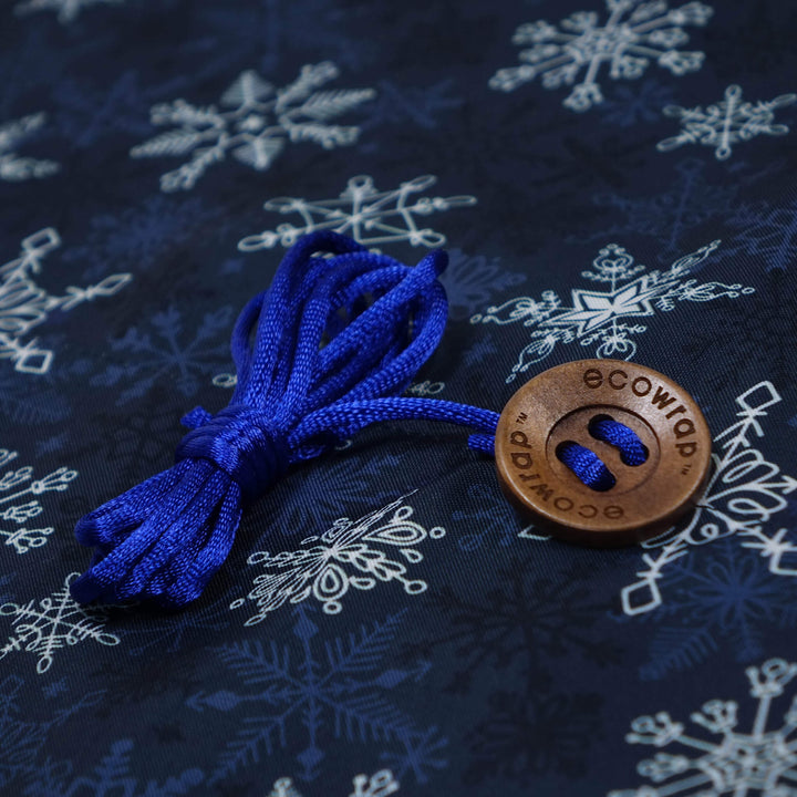 Emballage cadeau en tissu - Flocons de neige bleus