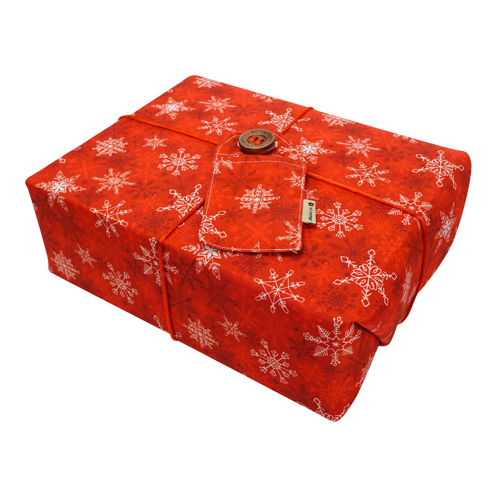 Emballage cadeau en tissu - Flocons de neige rouges